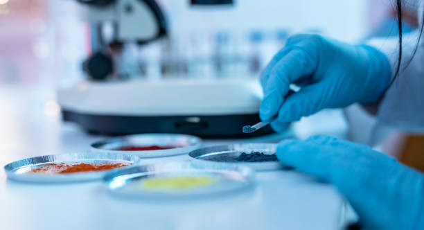 Young scientist conducting research investigations in a chemical laboratory.  The researcher studying different nutraceutical